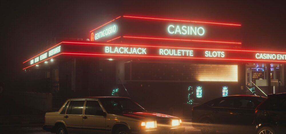 Modern architecture of an integrated resort and global gambling regulation map