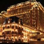 Aerial view of Macau casinos and tourism infrastructure at night